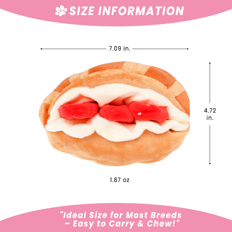 Product size information chart for the plush strawberry croissant dog toy, detailing dimensions of 7.09 inches in width, 4.72 inches in height, and a weight of 1.87 oz. Text emphasizes it is an "Ideal Size for Most Breeds - Easy to Carry & Chew!"